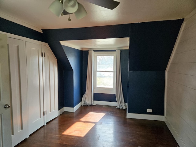16517 Plainview Dr, Markham, IL 60428 - bonus room with baseboards, dark wood-style flooring, and a ceiling fan