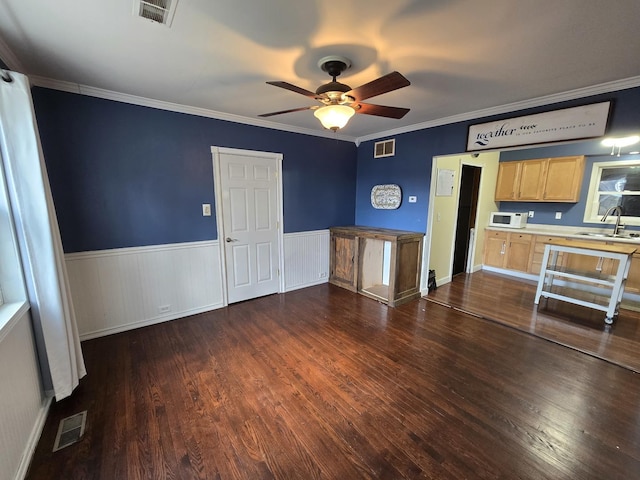 16517 Plainview Dr, Markham, IL 60428 - kitchen featuring white microwave, light brown cabinetry, ceiling fan, a sink, and dark wood-style flooring