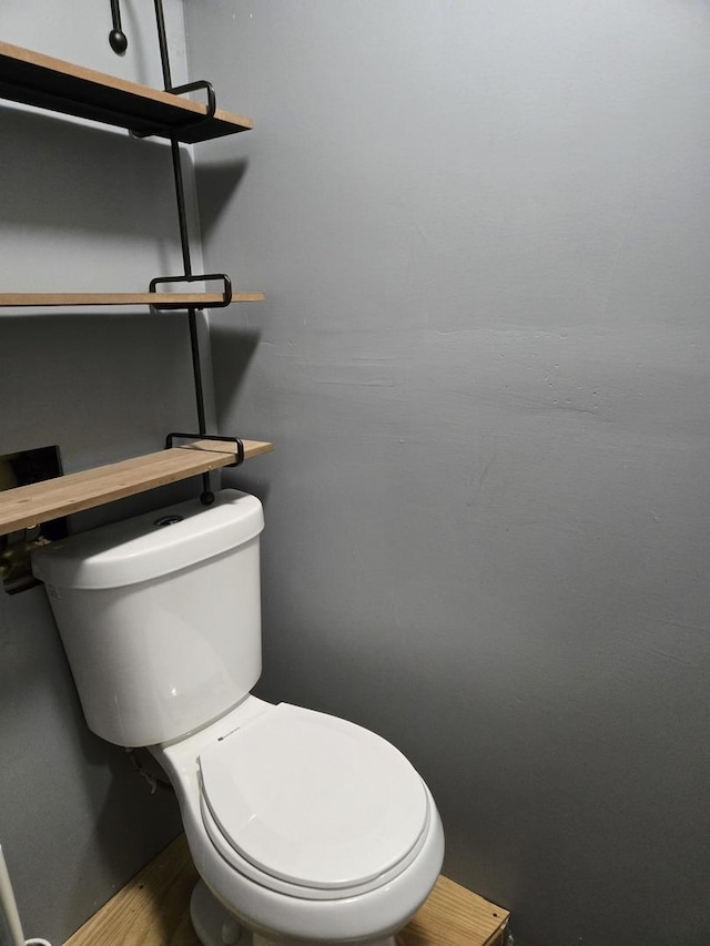 16517 Plainview Dr, Markham, IL 60428 - bathroom with toilet and wood finished floors