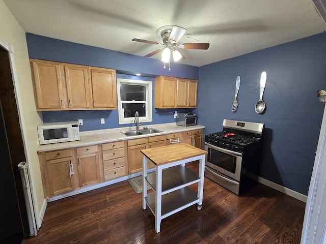 16517 Plainview Dr, Markham, IL 60428 - kitchen featuring stainless steel range with gas stovetop, white microwave, a sink, and light brown cabinets