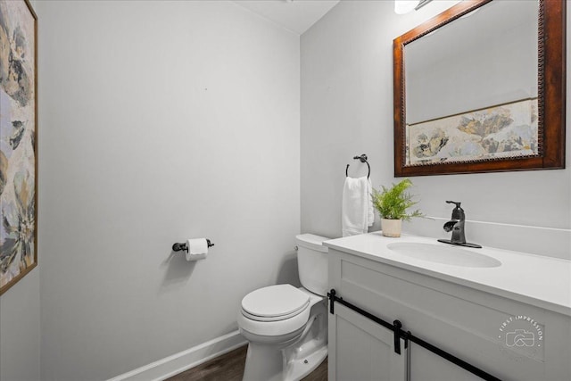 957 Whittington Dr, Geneva, IL 60134 - half bathroom featuring vanity and wood finished floors