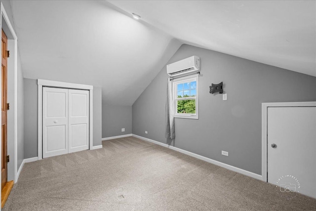 957 Whittington Dr, Geneva, IL 60134 - additional living space with an AC wall unit, lofted ceiling, and carpet floors