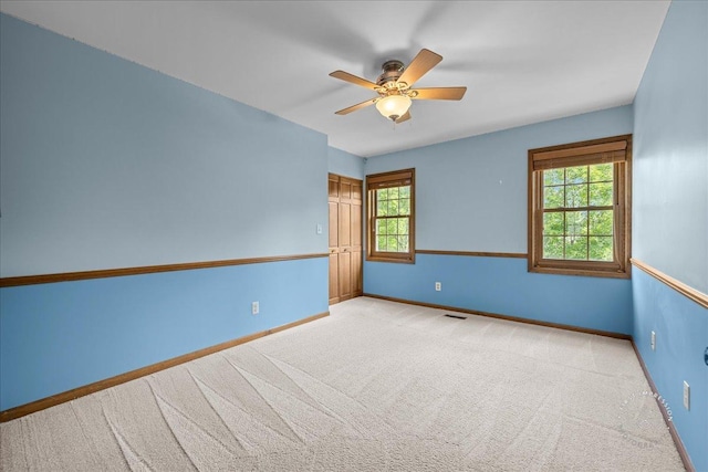 957 Whittington Dr, Geneva, IL 60134 - empty room with carpet, plenty of natural light, and a ceiling fan