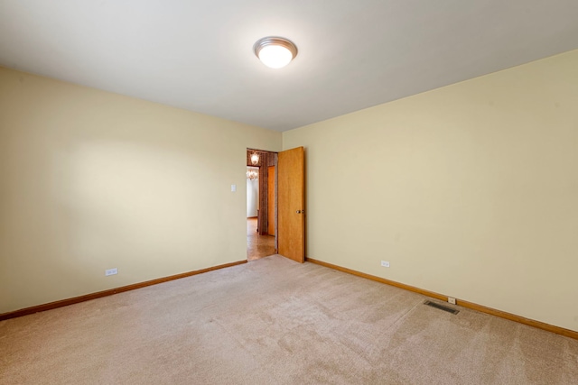 2728 N Neva Ave, Chicago, IL 60707 - unfurnished room with light colored carpet and baseboards