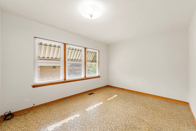 2728 N Neva Ave, Chicago, IL 60707 - unfurnished room with baseboards