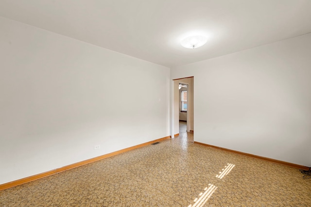2728 N Neva Ave, Chicago, IL 60707 - unfurnished room with baseboards