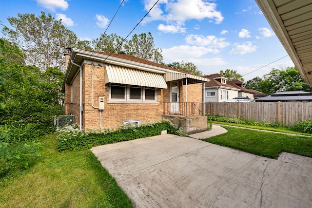 2728 N Neva Ave, Chicago, IL 60707 - view of front facade with brick siding and a patio
