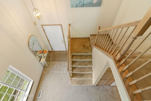 377 Locksley Dr, Streamwood, IL 60107 - staircase with a high ceiling