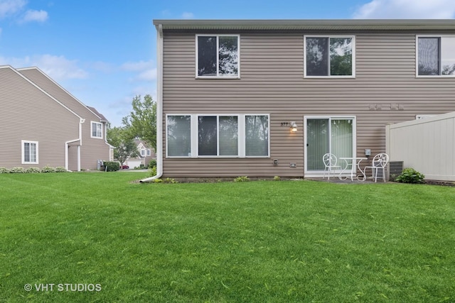 377 Locksley Dr, Streamwood, IL 60107 - back of house with a yard