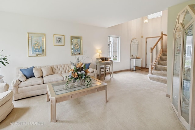 377 Locksley Dr, Streamwood, IL 60107 - carpeted living room featuring stairs and baseboards