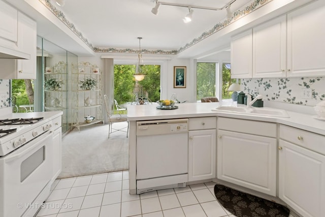 377 Locksley Dr, Streamwood, IL 60107 - kitchen featuring white appliances, a peninsula, white cabinetry, and light tile patterned floors