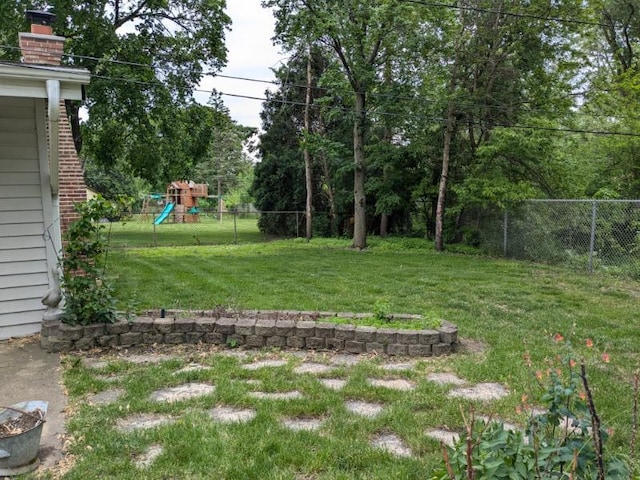 7202 Edgebrook Ln, Hanover Park, IL 60133 - fenced backyard with a playground