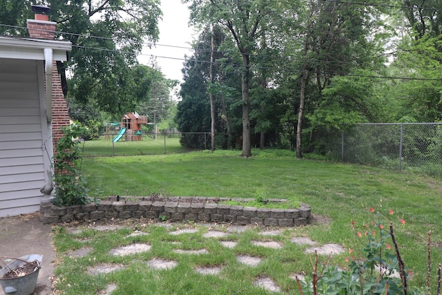7202 Edgebrook Ln, Hanover Park, IL 60133 - fenced backyard featuring a playground