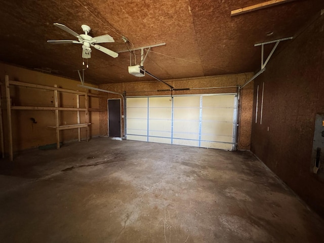 310 N 3rd Ave, Chenoa, IL 61726 - garage featuring a garage door opener
