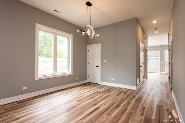 10921 S Hermosa Ave, Chicago, IL 60643 - empty room featuring wood finished floors, a chandelier, baseboards, and recessed lighting