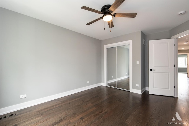 10921 S Hermosa Ave, Chicago, IL 60643 - unfurnished bedroom with dark wood-style floors, a closet, baseboards, and a ceiling fan