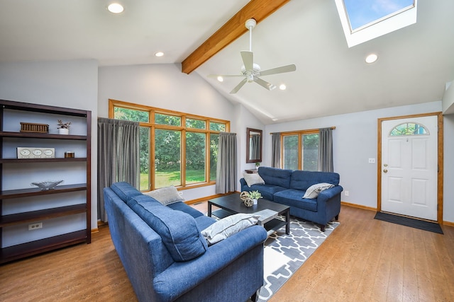 27W108 Walnut Dr, Winfield, IL 60190 - living room with beam ceiling, recessed lighting, wood finished floors, ceiling fan, and a skylight