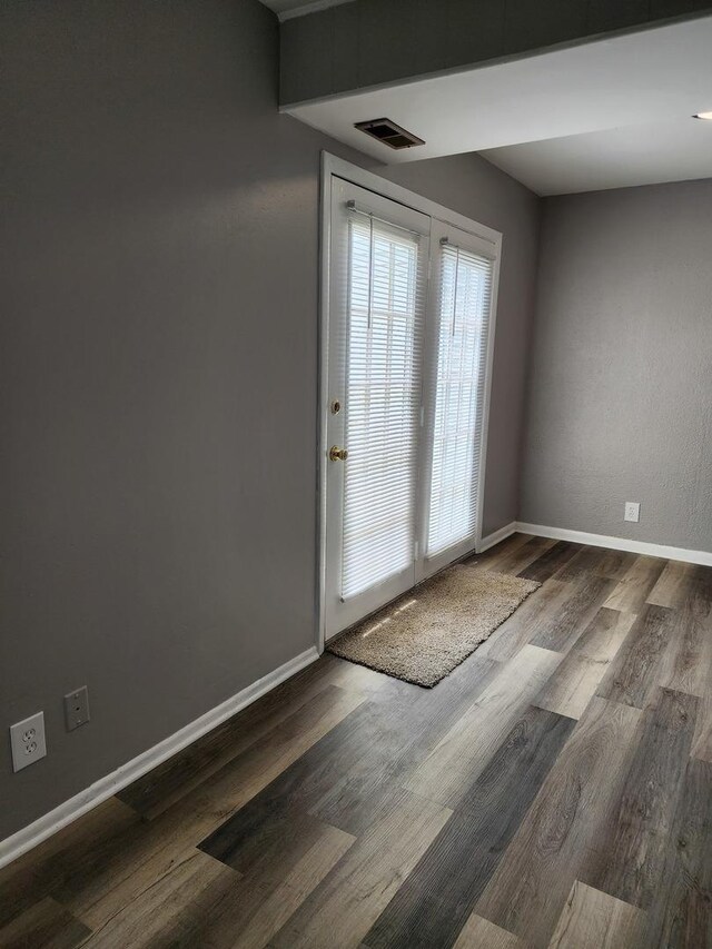 2330 Carnation Dr Unit 2330, Crest Hill, IL 60403 - unfurnished room featuring baseboards and wood finished floors