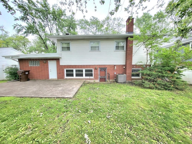 718 Central Park Ave, Flossmoor, IL 60422 - back of house featuring a patio, a yard, a chimney, and central AC unit