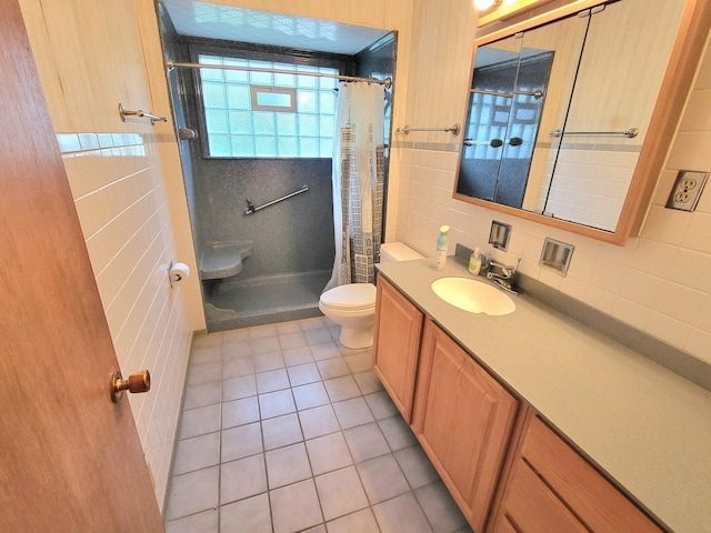 718 Central Park Ave, Flossmoor, IL 60422 - bathroom featuring tile patterned floors, tile walls, toilet, vanity, and tiled shower