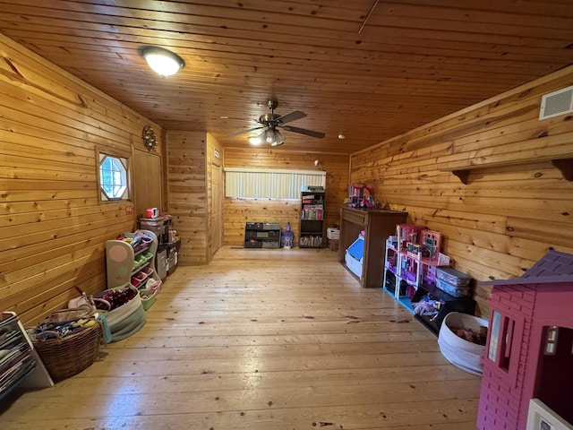 5280 S Harlan Dr, Rochelle, IL 61068 - bonus room featuring wood walls, a ceiling fan, light wood finished floors, and wooden ceiling