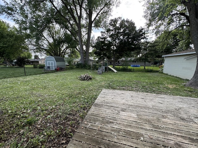 5280 S Harlan Dr, Rochelle, IL 61068 - wooden deck with a playground