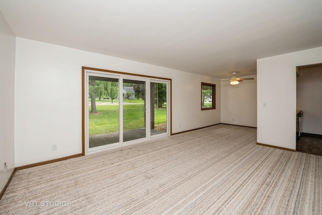 3525 Saint Anthony Way Unit 7A, Rockford, IL 61101 - unfurnished room featuring carpet flooring and ceiling fan