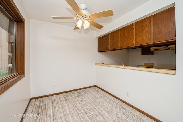 3525 Saint Anthony Way Unit 7A, Rockford, IL 61101 - carpeted spare room with a ceiling fan and baseboards