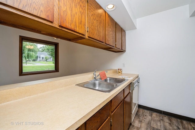 3525 Saint Anthony Way Unit 7A, Rockford, IL 61101 - kitchen with light countertops, dark wood-type flooring, dishwasher, brown cabinets, and recessed lighting