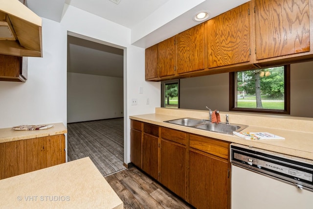 3525 Saint Anthony Way Unit 7A, Rockford, IL 61101 - kitchen featuring white dishwasher, light countertops, dark wood-type flooring, and brown cabinets