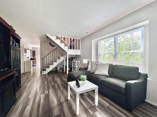 513 Nebraska Cir, Carol Stream, IL 60188 - living room with stairs, dark wood-style flooring, and baseboards
