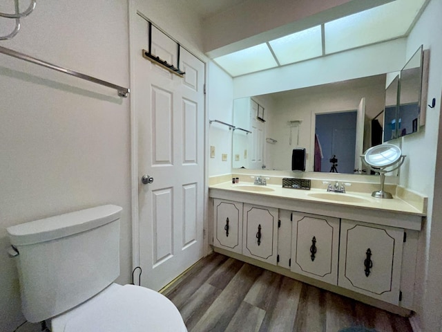 513 Nebraska Cir, Carol Stream, IL 60188 - bathroom with toilet, wood finished floors, and double vanity