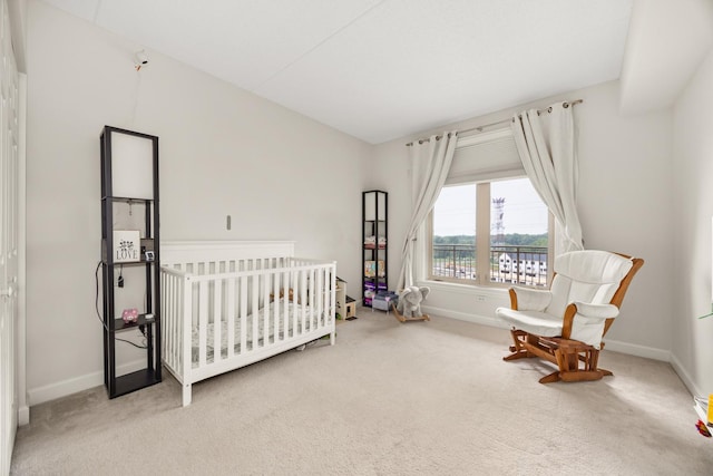 8340 Callie Ave Unit 506, Morton Grove, IL 60053 - bedroom featuring carpet floors, baseboards, and a crib