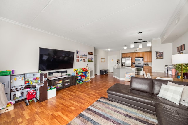 8340 Callie Ave Unit 506, Morton Grove, IL 60053 - living room featuring ornamental molding, light wood-type flooring, and baseboards