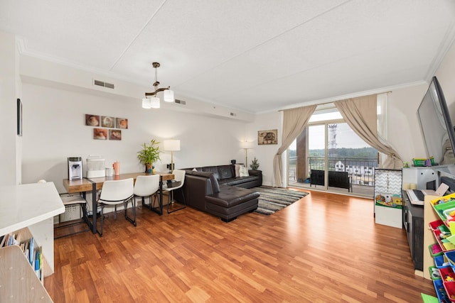8340 Callie Ave Unit 506, Morton Grove, IL 60053 - living area featuring crown molding and light wood-type flooring