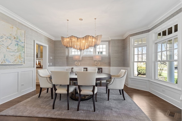 622 S Washington St, Hinsdale, IL 60521 - dining area with dark wood-type flooring, a chandelier, wallpapered walls, wainscoting, and ornamental molding