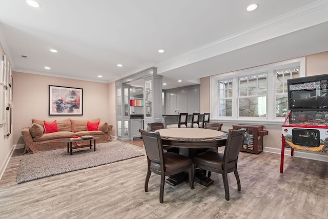 622 S Washington St, Hinsdale, IL 60521 - dining space with crown molding, wood finished floors, and recessed lighting