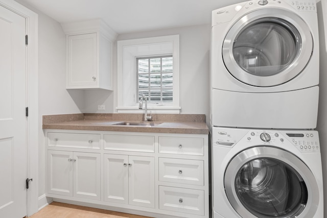 622 S Washington St, Hinsdale, IL 60521 - washroom featuring stacked washer and clothes dryer and cabinet space