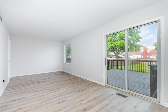 7490 Filmore Ave, Hanover Park, IL 60133 - empty room with wood finished floors
