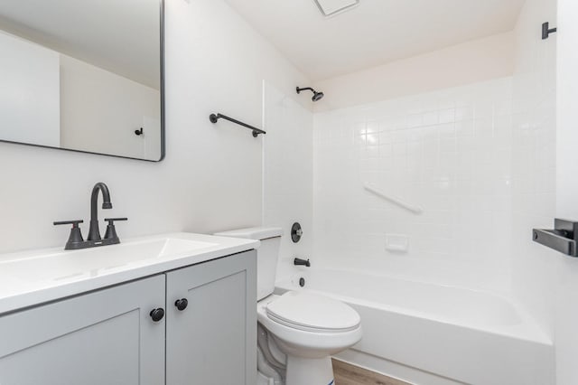 7490 Filmore Ave, Hanover Park, IL 60133 - bathroom featuring vanity, shower / washtub combination, and wood finished floors