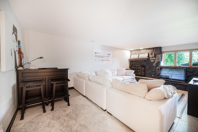 25429 W Cedar Crest Ln, Lake Villa, IL 60046 - living room featuring a stone fireplace and baseboards