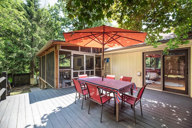 25429 W Cedar Crest Ln, Lake Villa, IL 60046 - wooden terrace featuring a sunroom and outdoor dining space