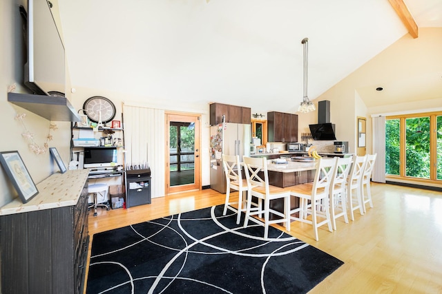 25429 W Cedar Crest Ln, Lake Villa, IL 60046 - dining area with light wood finished floors, beam ceiling, high vaulted ceiling, and an office area