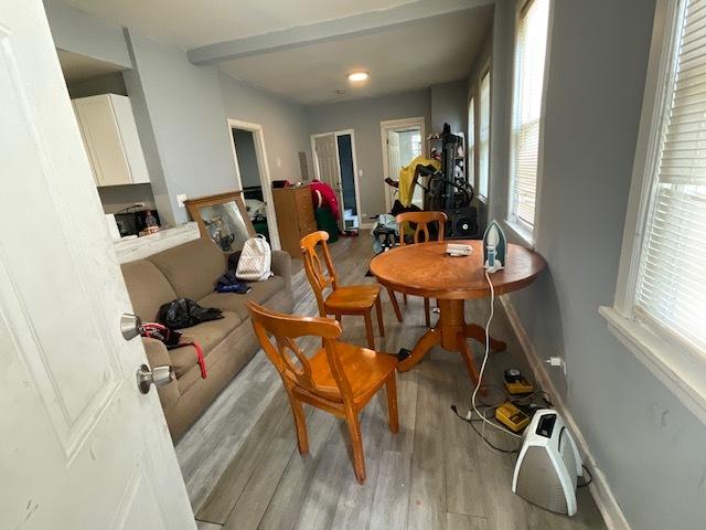 8205 S Houston Ave, Chicago, IL 60617 - dining area with light wood finished floors