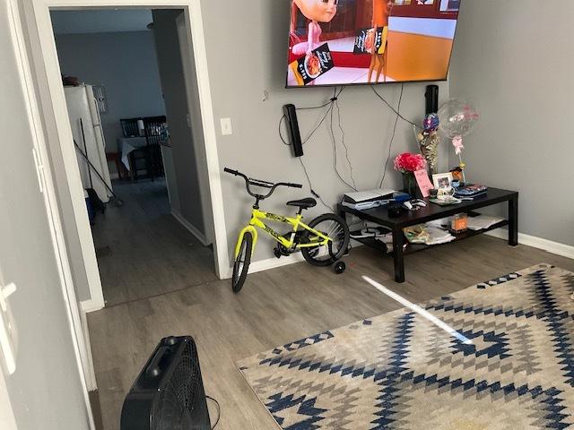 8205 S Houston Ave, Chicago, IL 60617 - exercise area featuring wood finished floors and baseboards