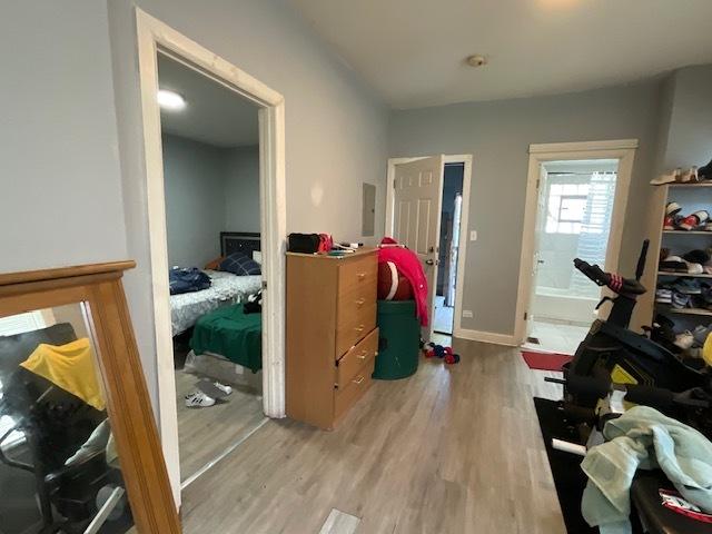 8205 S Houston Ave, Chicago, IL 60617 - interior space with wood finished floors and electric panel