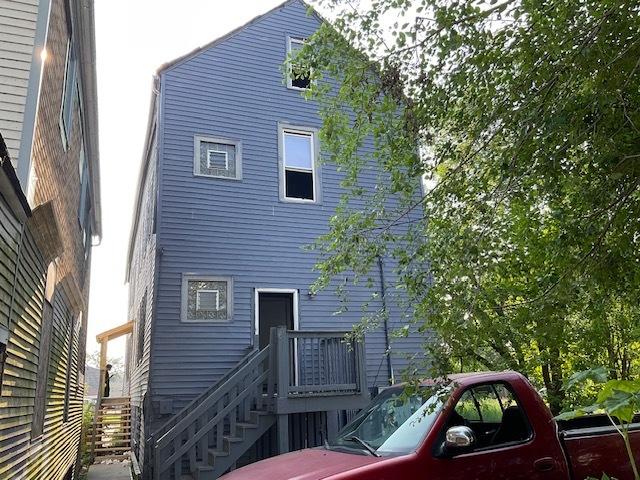 8205 S Houston Ave, Chicago, IL 60617 - rear view of property featuring stairs