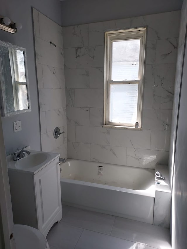 8205 S Houston Ave, Chicago, IL 60617 - bathroom with vanity, healthy amount of natural light, tile patterned flooring, and shower / bathtub combination