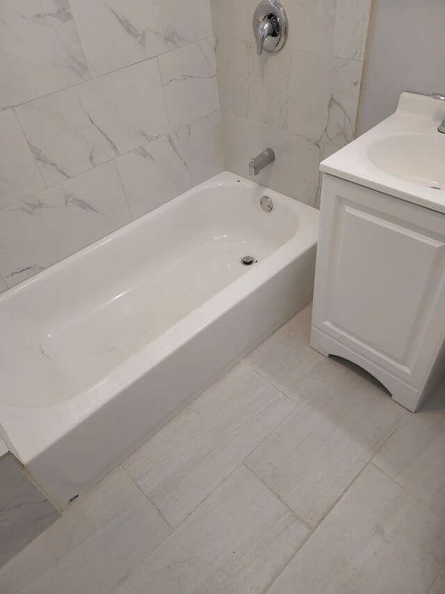8205 S Houston Ave, Chicago, IL 60617 - full bathroom featuring vanity and  shower combination