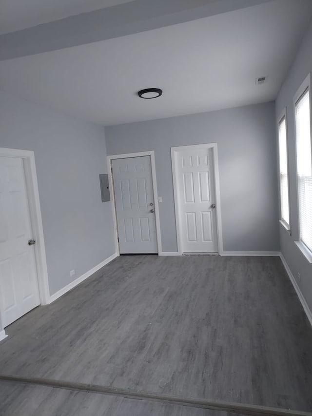8205 S Houston Ave, Chicago, IL 60617 - spare room with dark wood-style floors